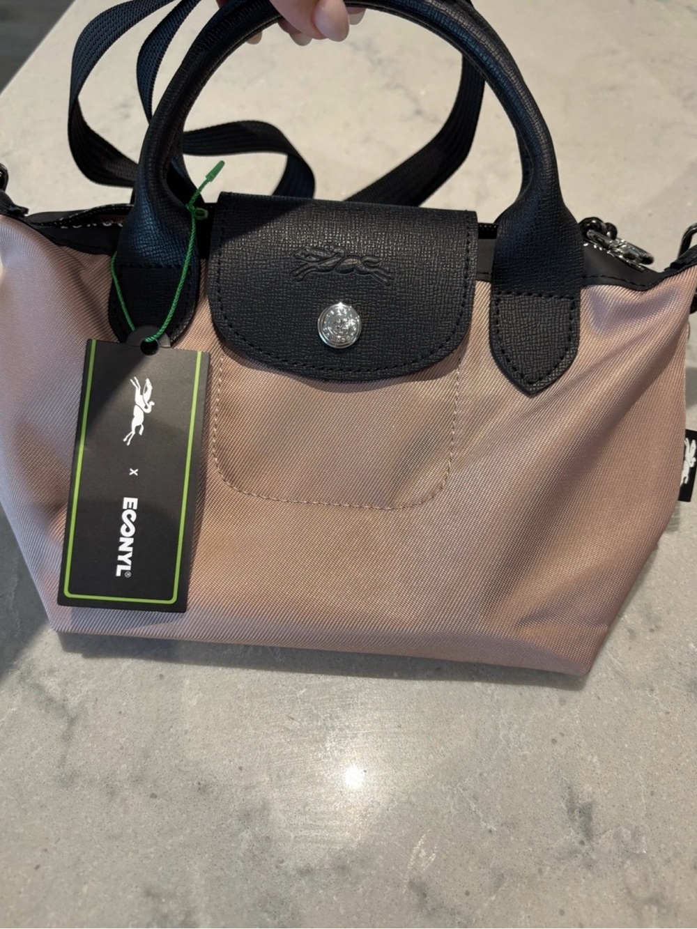 Longchamp mini tote in blush pink with black trim